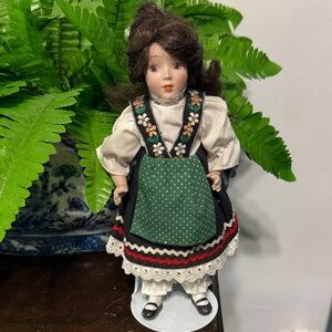 Vintage Porcelain Doll in Traditional Dress